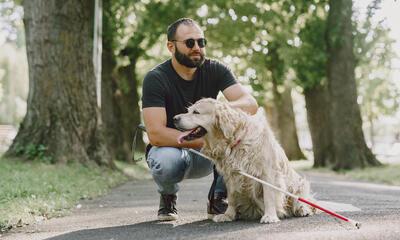 Blinde man met hond